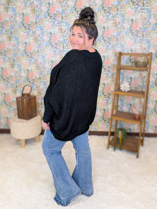 Bari Popcorn Knit Poncho Sweater in Black