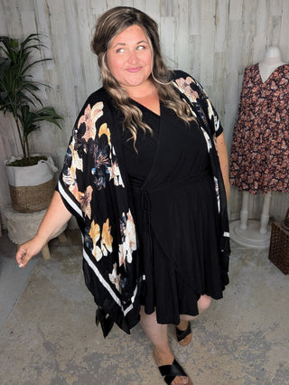 Briar Surplice Flutter Romper Dress in True Black-11- Dress/Romp/Jump-WHITE BIRCH-Styled by Stacked - A Plus Size Women's Boutique in Lakeville, MN