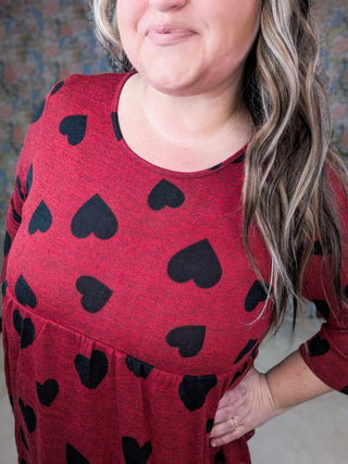 Delaine 3/4 Sleeve Babydoll in Red w/Black Hearts-2- Long Sleeve Tops-HEIMISH-Styled by Stacked - A Plus Size Women's Boutique in Lakeville, MN