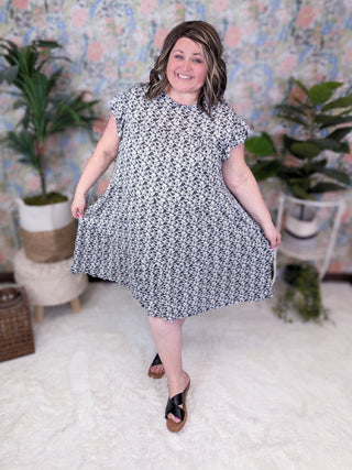 Gentry Tiered Short Sleeve Dress in Black + White Florals-11- Dress/Romp/Jump-sweet lovely by jen-Styled by Stacked - A Plus Size Women's Boutique in Lakeville, MN