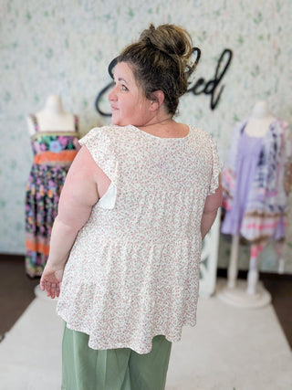 Madelyn Flutter Sleeve Tiered Top in Ivory Ditsy Floral-1- ShortSlv/Slvless Tops-HEIMISH-Styled by Stacked - A Plus Size Women's Boutique in Lakeville, MN