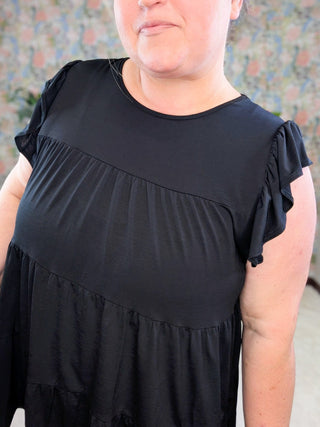Lynn Flowy Tiered Flutter Sleeve Top in Solid Black-1- ShortSlv/Slvless Tops-HEIMISH-Styled by Stacked - A Plus Size Women's Boutique in Lakeville, MN