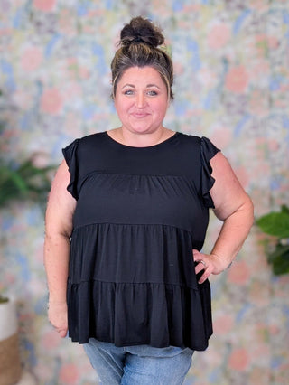 Lynn Flowy Tiered Flutter Sleeve Top in Solid Black-1- ShortSlv/Slvless Tops-HEIMISH-Styled by Stacked - A Plus Size Women's Boutique in Lakeville, MN
