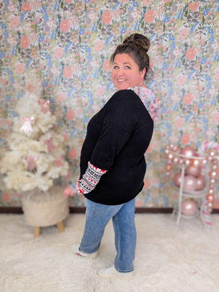 Reindeer Patch Hooded Top in Black-2- Long Sleeve Tops-HEIMISH-Styled by Stacked - A Plus Size Women's Boutique in Lakeville, MN